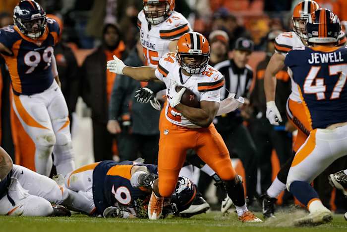 Browns running back Nick Chubb (24) runs the ball in the fourth quarter against the Broncos at Broncos Stadium at Mile High in Denver, Dec. 15, 2018.